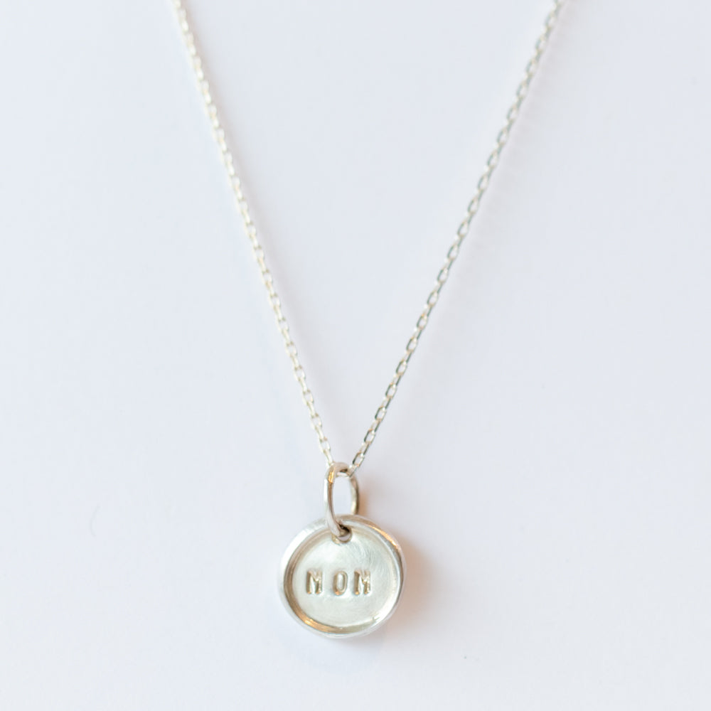 Tiny "MOM" Disc Charm