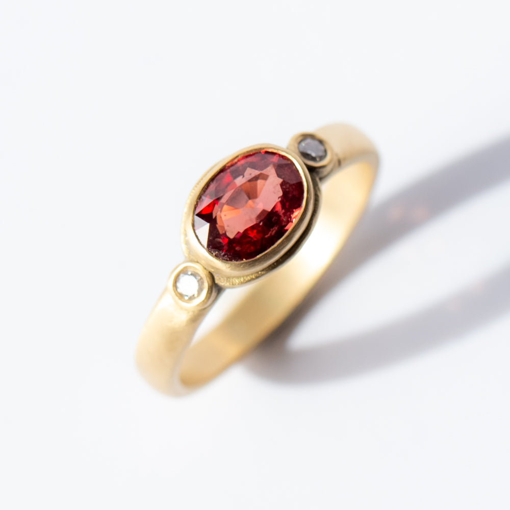 Orange-Red Sapphire Ring with Diamonds
