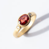 Orange-Red Sapphire Ring with Diamonds