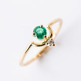 Small Round Nestled Emerald and Diamond Ring