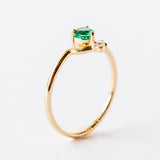 Small Round Nestled Emerald and Diamond Ring