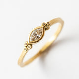 Small Marquise Diamond Ring with Diamond Clusters
