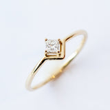 Small Nestled Princess Cut Diamond Ring