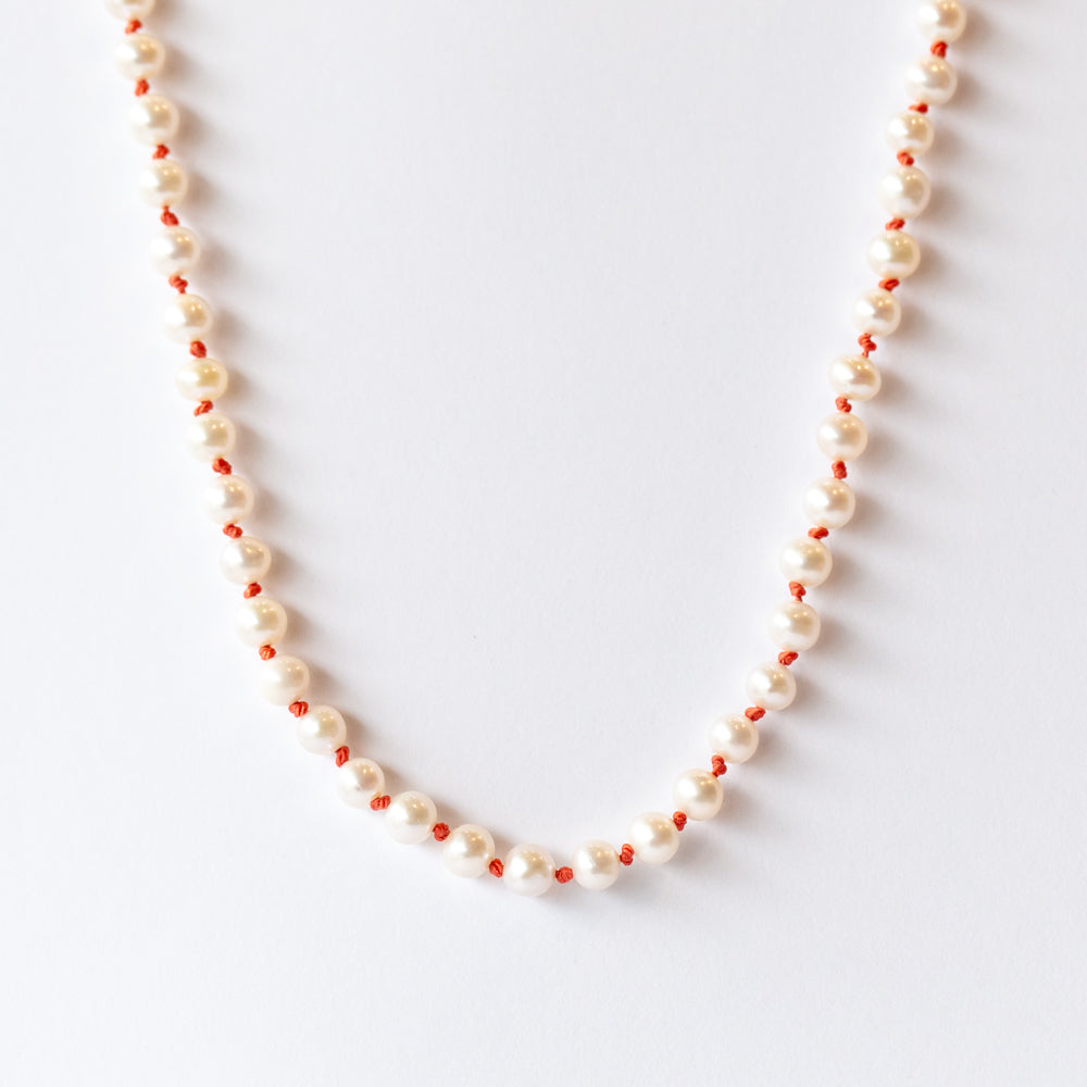 Round Pearl Toggle Necklace on Coral Thread
