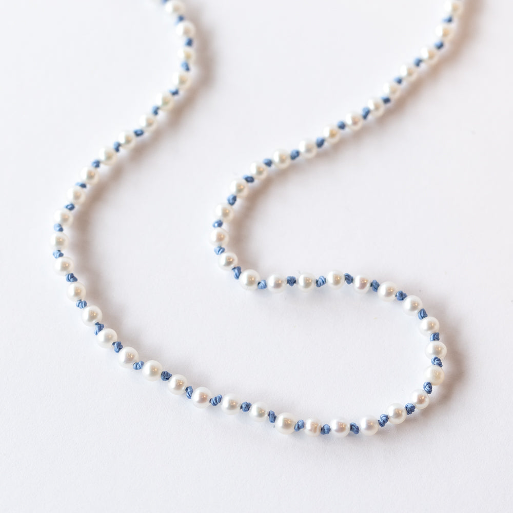 Seed Pearl Necklace on Blue Thread