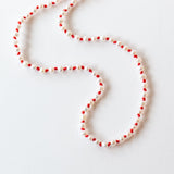 Seed Pearl Necklace on Red Thread