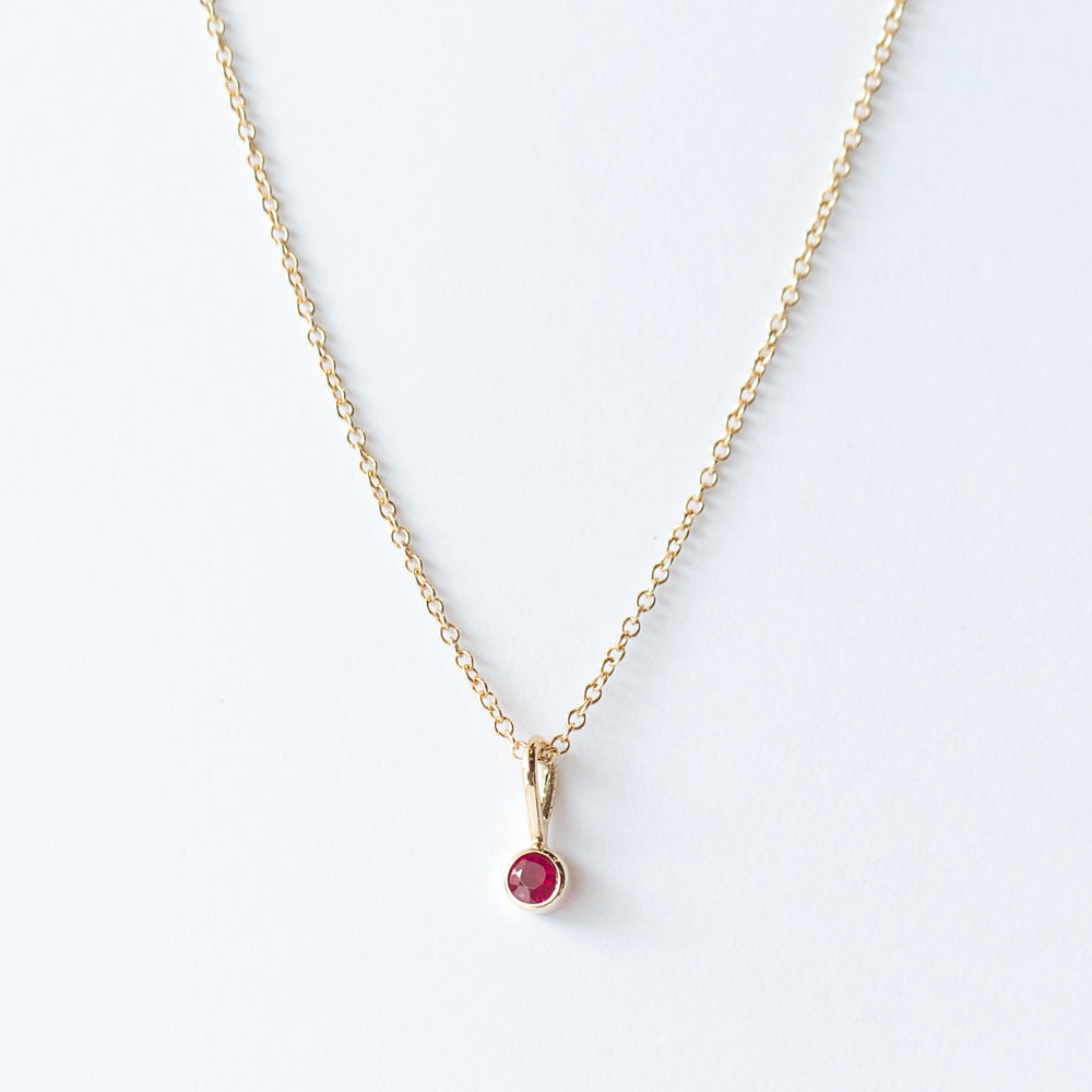 Bezel Set Ruby Charm