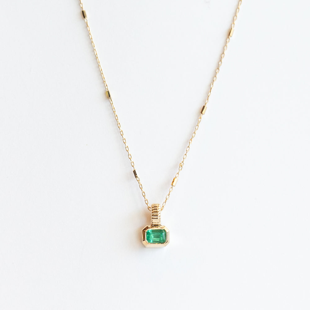 Bezel Set Emerald Cut Emerald Solitaire Necklace