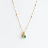 Bezel Set Emerald Cut Emerald Solitaire Necklace