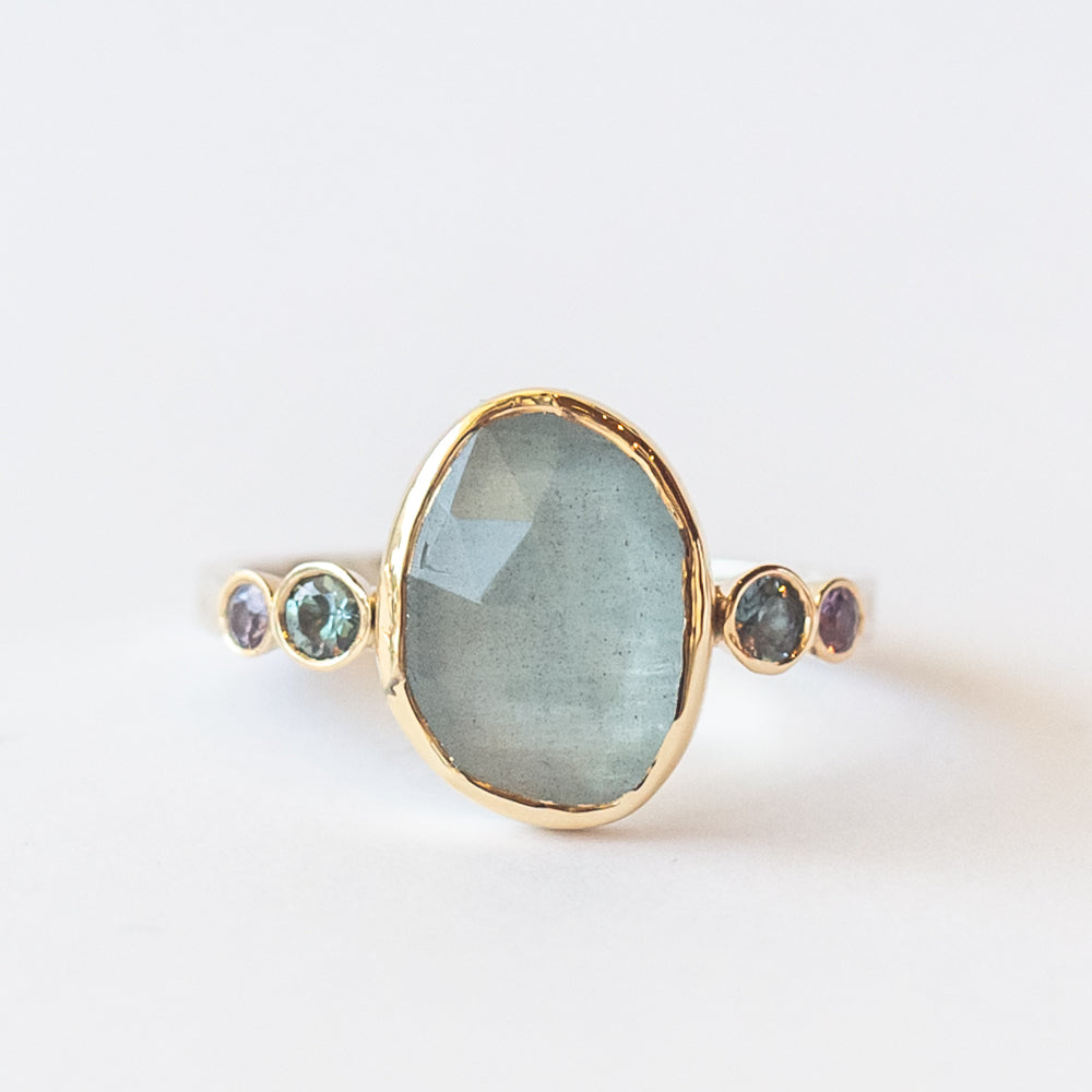 Asymmetrical Oval Aquamarine Ring with Sapphires