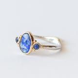 Asymmetrical Oval Sapphire Ring with Accent Sapphires