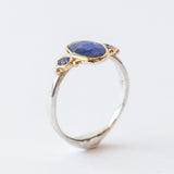 Asymmetrical Oval Sapphire Ring with Accent Sapphires
