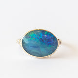 Oval Opal Ring with Accent Diamonds
