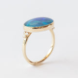 Oval Opal Ring with Accent Diamonds