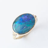 Oval Opal Ring with Accent Diamonds