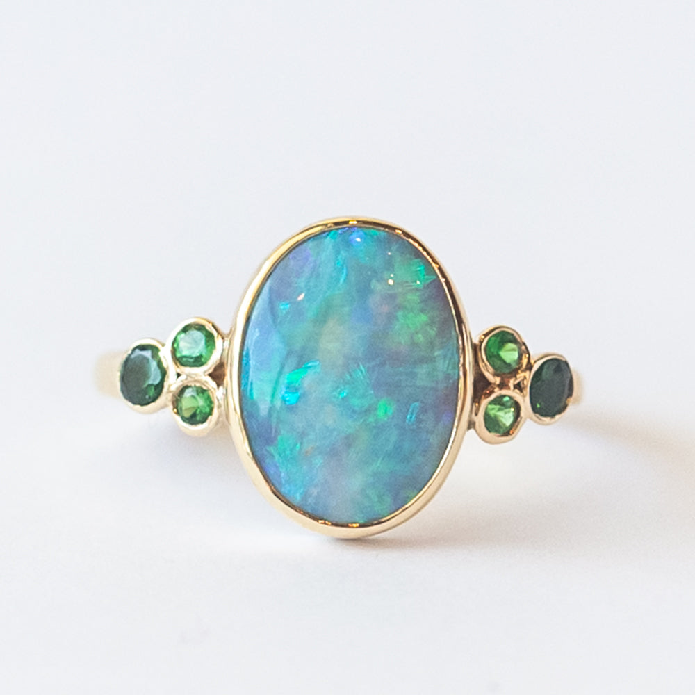 Oval Opal Ring with Accent Emeralds