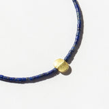 Dark Lapis Tube Beaded Bracelet with Oval Flat Gold Bead