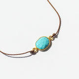 Large Oval Faceted Turquoise Cord Bracelet