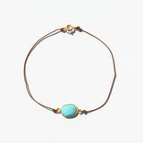 Large Oval Faceted Turquoise Cord Bracelet