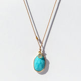 Oval Turquoise Cord Necklace with Round Diamond Slice Dangle