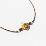 Tiny Emerald and Gold Flower Cord Bracelet