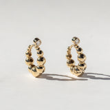 Graduated Bead Huggie Hoop Earrings with Bezel-Set Diamonds
