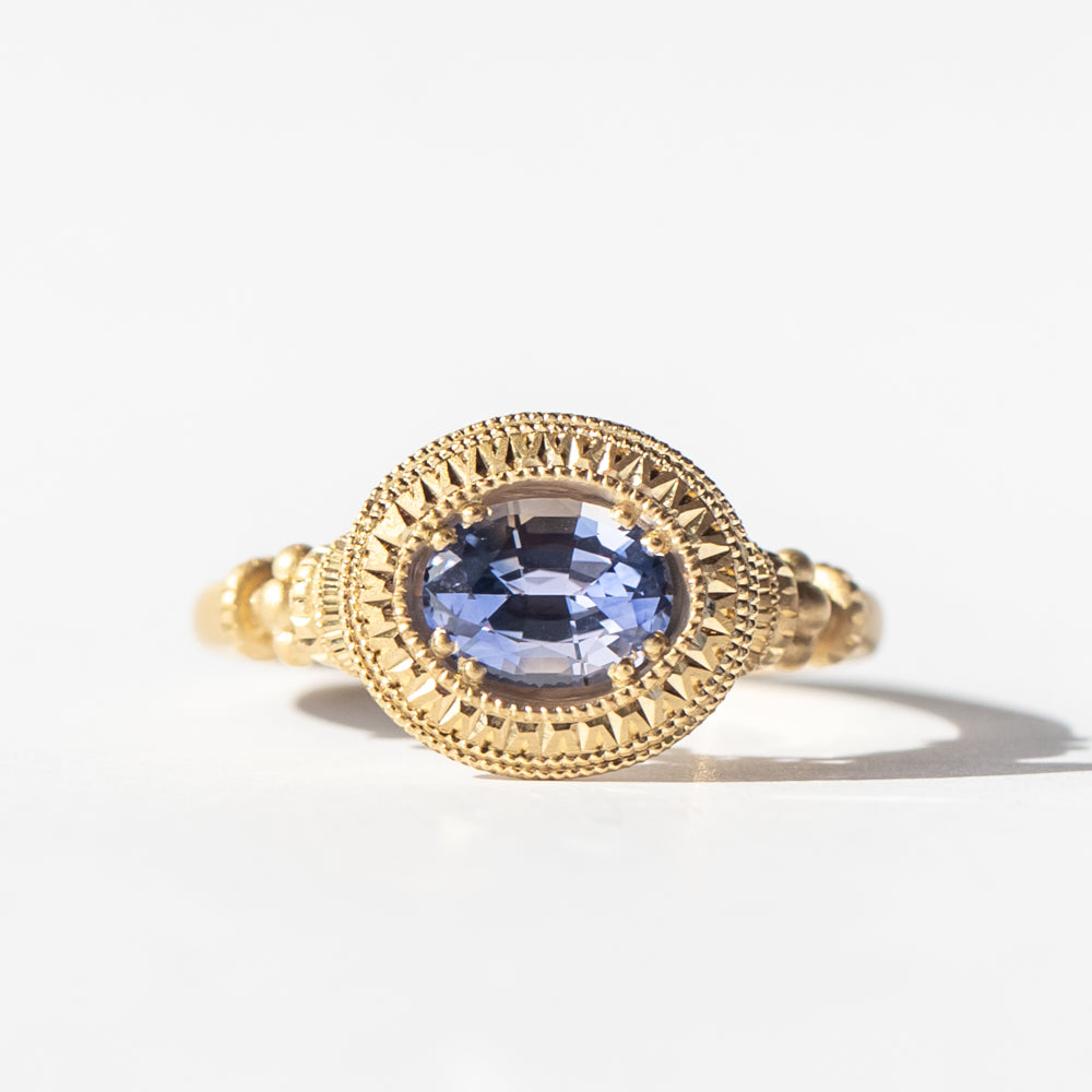 Engraved Bi-Color Oval Sapphire Pedestal Solitaire Ring