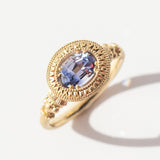 Engraved Bi-Color Oval Sapphire Pedestal Solitaire Ring