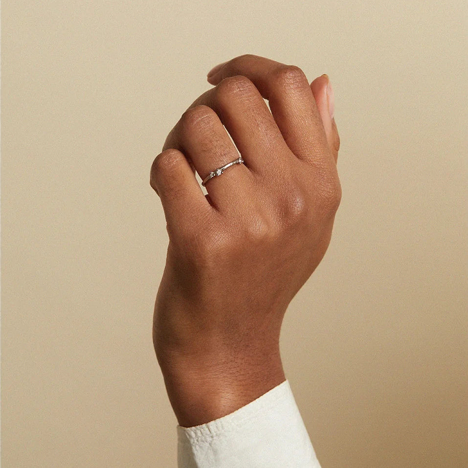 Small Asymmetric Diamond Encrusted Band