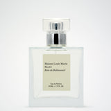 Maison Louis Marie No.04 Bois de Balincourt Eua de Parfum bottle, clear perfume bottle with a silver banded lid.