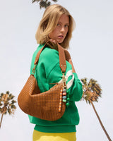 Moyen Messenger, Tan Rattan