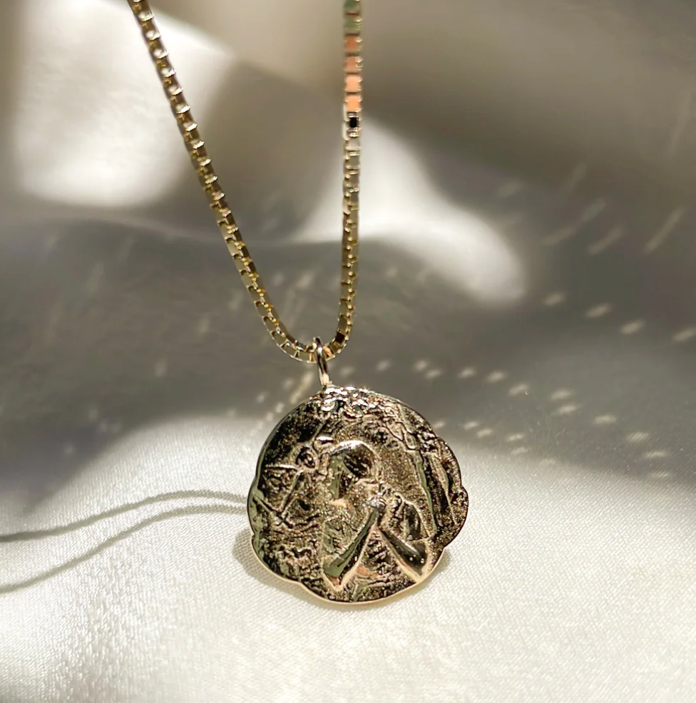 Communion by Joy carved Joan of Arc pendant necklace.