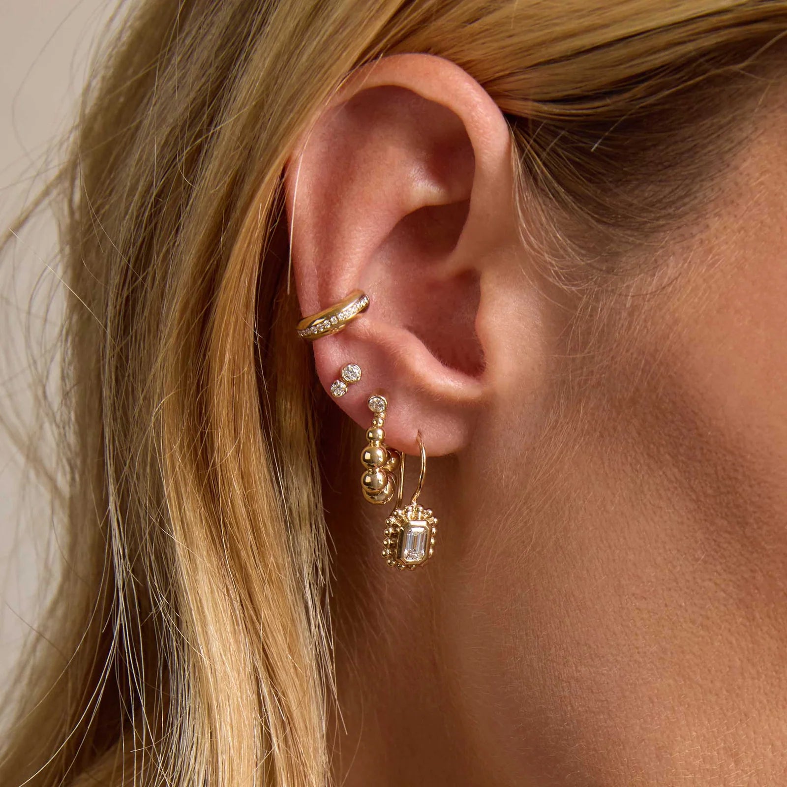 Graduated Bead Huggie Hoop Earrings with Bezel-Set Diamonds