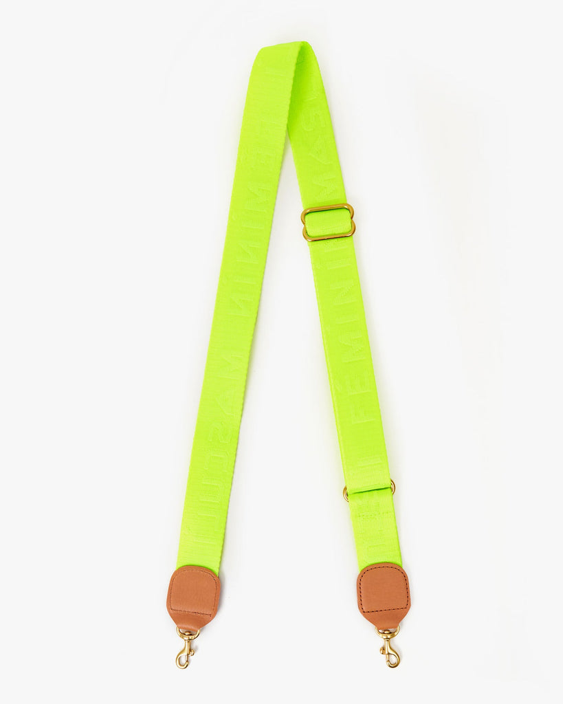neon yellow adjustable crossbody purse strap with gold hardware and brown leather detail