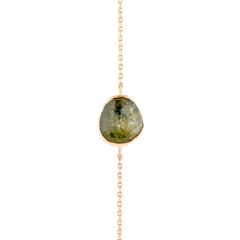 Celine D'aoust gold bracelet with green tourmaline, top view