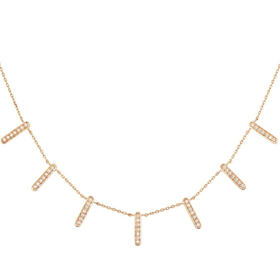 Celine D'aoust gold necklace with diamond dangles, front view