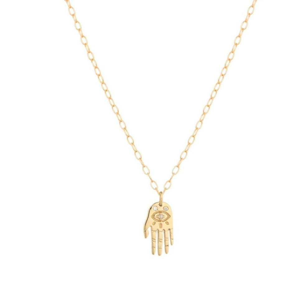 Celine D'aoust gold necklace with small hand charm and diamonds, front view