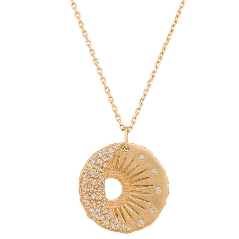 Celine D'aoust gold necklace with sun and moon pendant with diamonds, front view