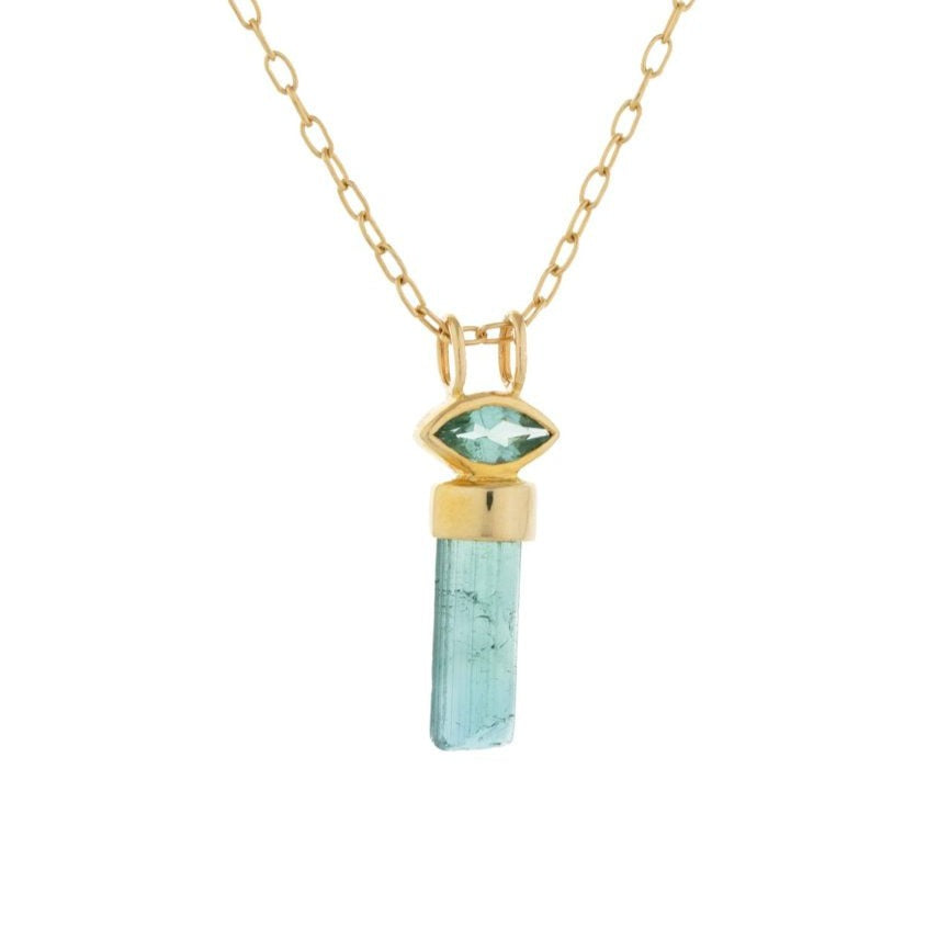 Celine D’aoust gold necklace with blue tourmaline pendant, front view