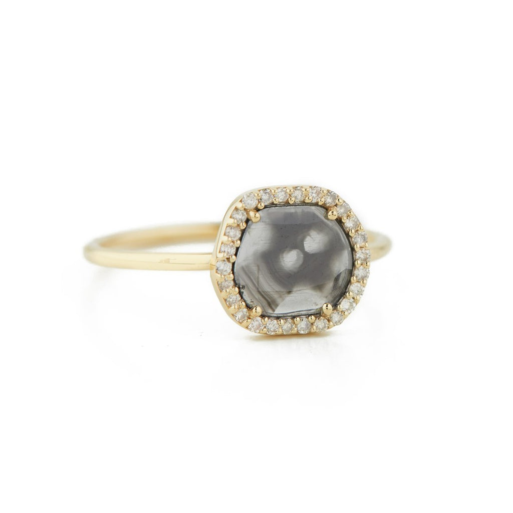 Celine D'aoust gold ring with gray diamond slice and diamonds, angled front view