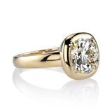 Single Stone gold ring with diamond, angled side view