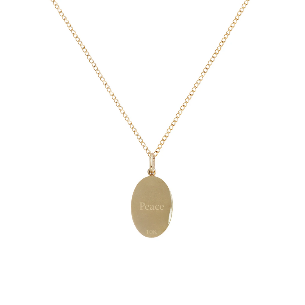 Zahava gold necklace with pendant engraved with peace text, back view