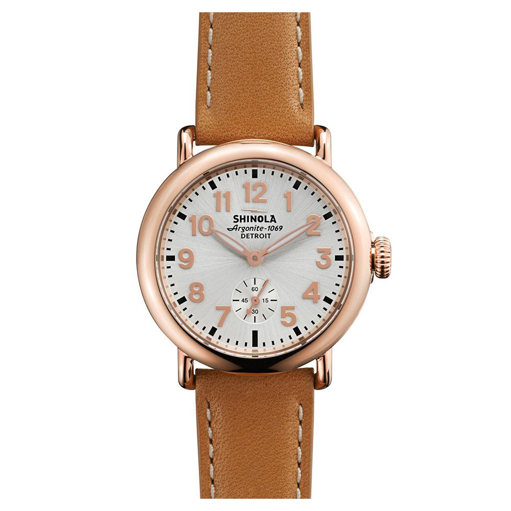 Shinola rose gold watch with brown leather strap, front view