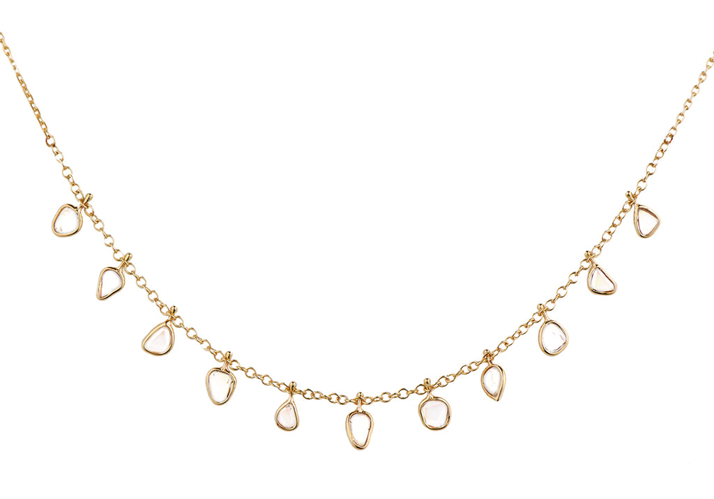Celine D'aoust gold necklace with diamond slices, front view