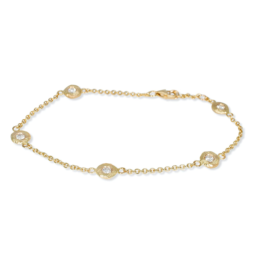 Page Sargisson gold chain bracelet with diamonds, top view