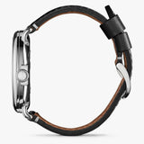 Shinola black face stainless steel watch black leather strap, side view