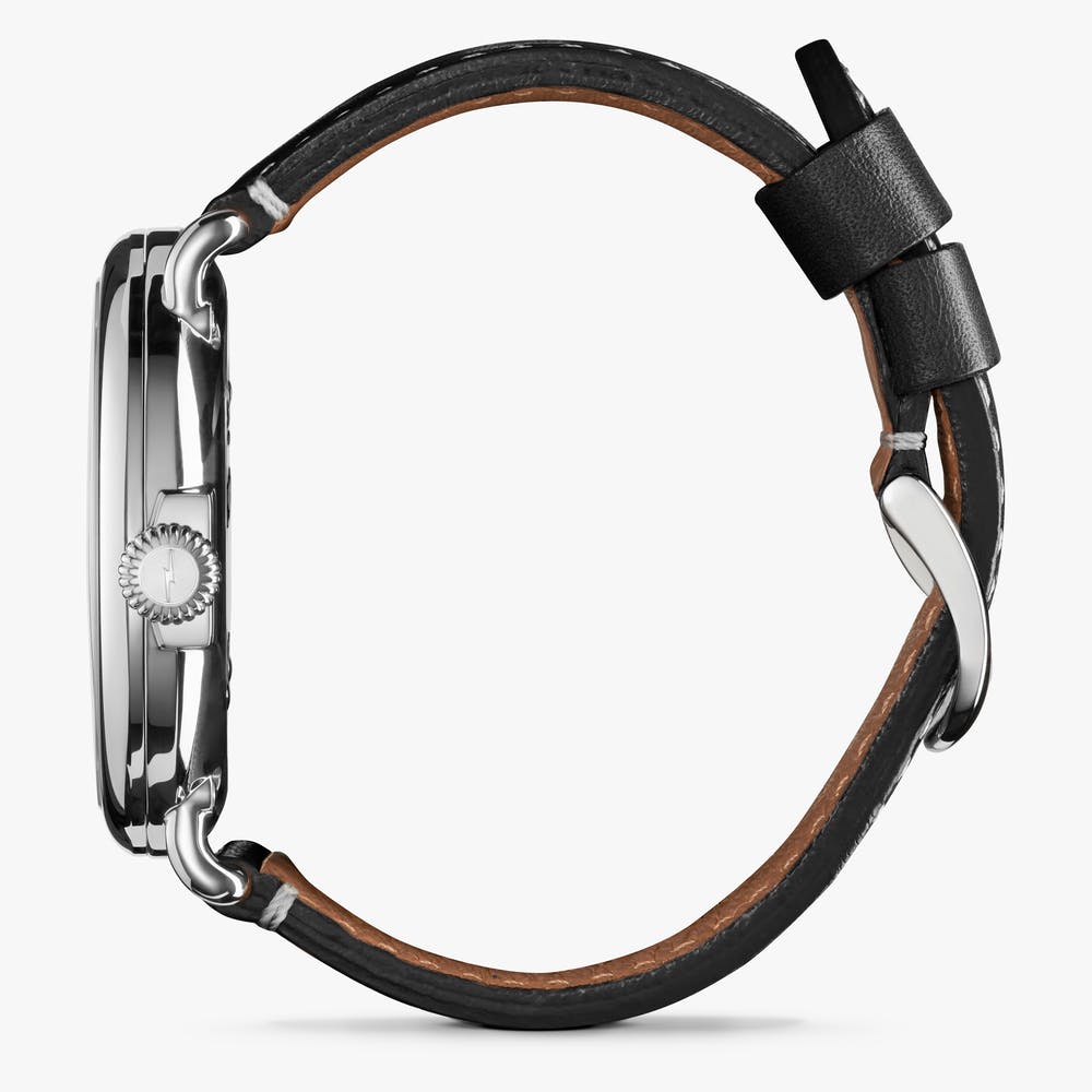 Shinola black face stainless steel watch black leather strap, side view
