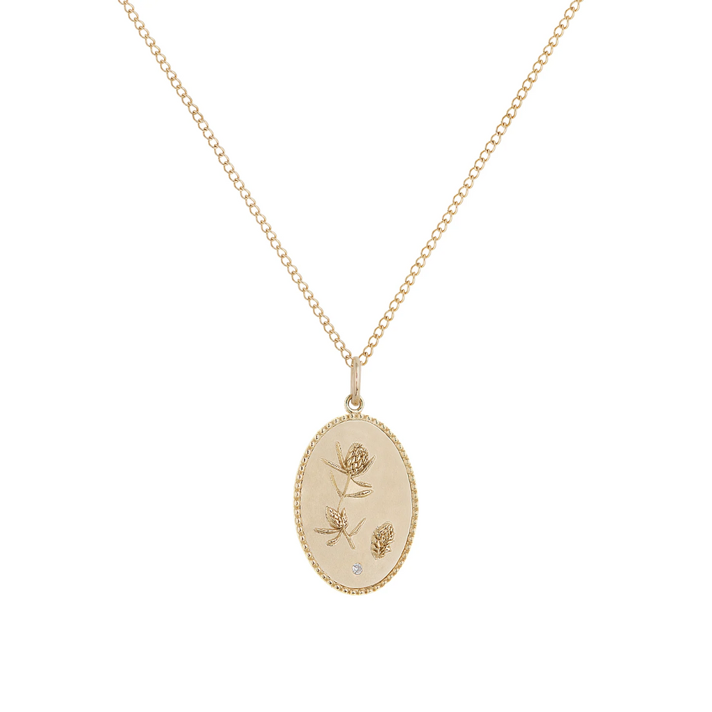 Zahava gold necklace with flower pendant, front view
