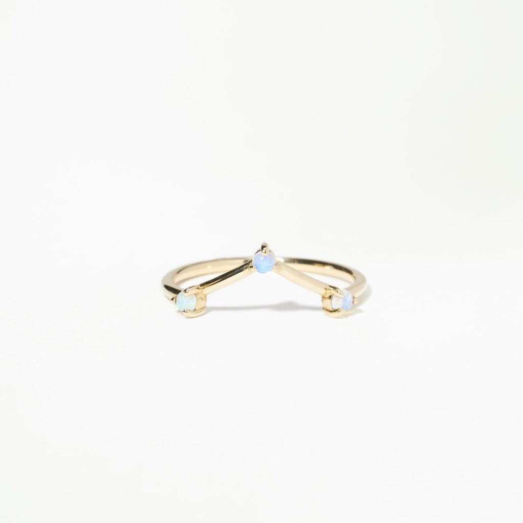 Wwake gold pointed band with 3 opals, front view
