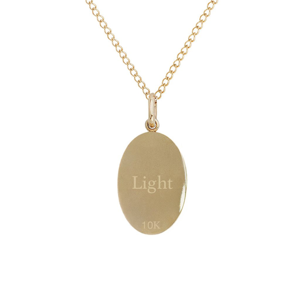 Zahava gold necklace with pendant engraved with light text, back view
